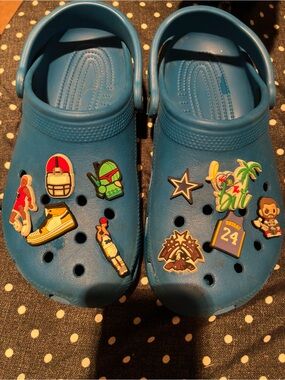 CROCS Unisex Blue Clog Sandals with 10 Jibbitz Charms, mainly basketball charms.
